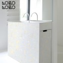 Vinyl with yellow terrazzo printing to decorate furniture in the bathroom