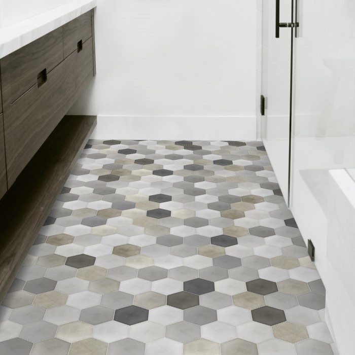 Vinilo para la decoración de suelos de hogar y locales con un elegante diseño de hexágonos grises adaptado para andar por encima